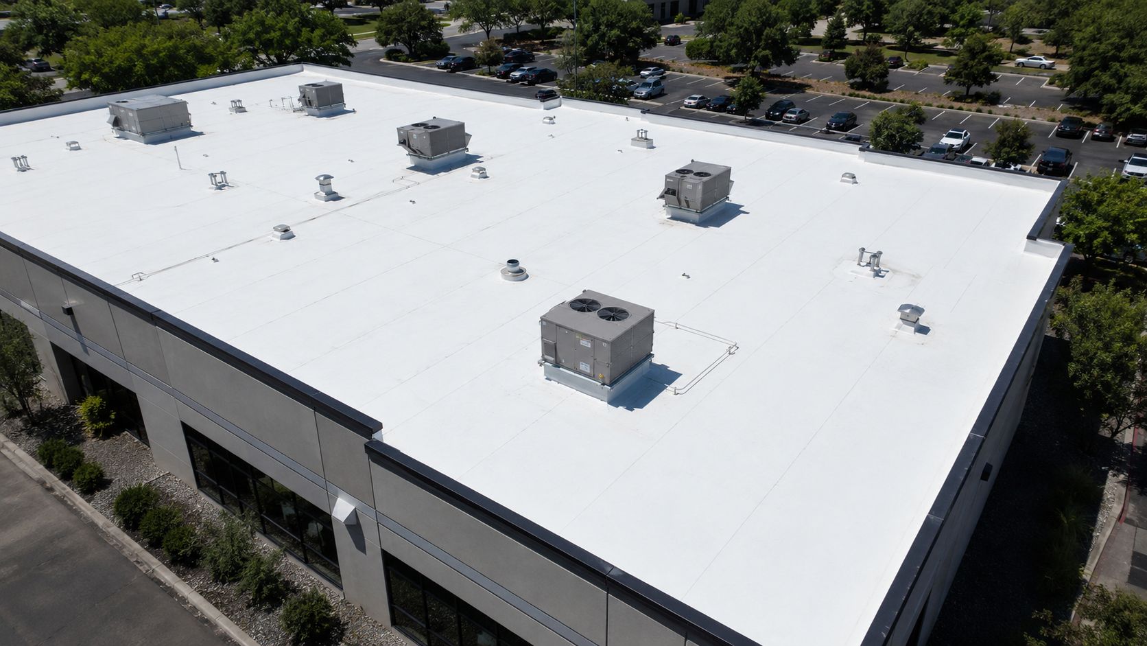 flat commercial roof with rooftop units