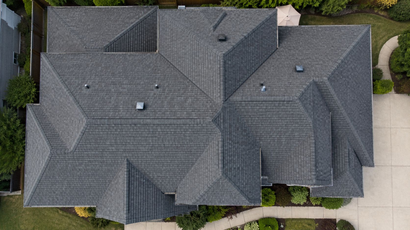 top-down view of a geometric residential roof pattern
